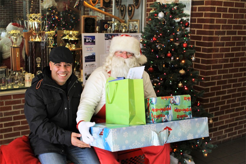 OWW trip 2b 120916 smiling soldier with gifts